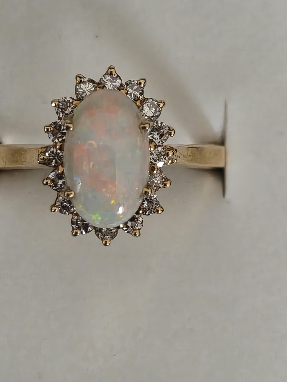 14k Gold Opal Halo Ring with White Opal Center and Diamonds
